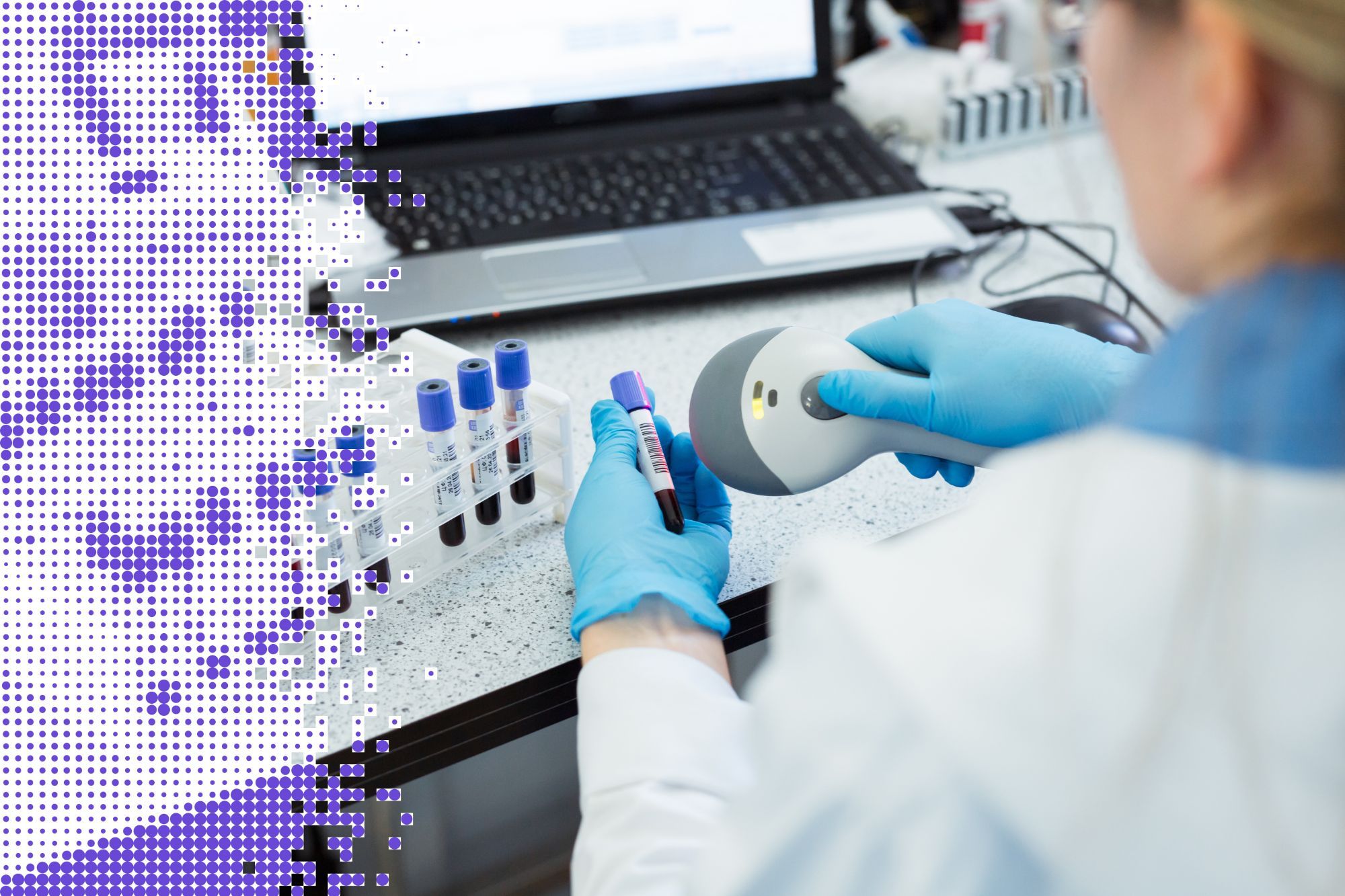 Lab technician in blue gloves scanning the barcode on a blood sample tube beside a rack of specimens and a laptop, with a purple dot-matrix pattern on the left