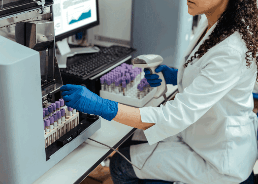 Lab technician working with automated systems